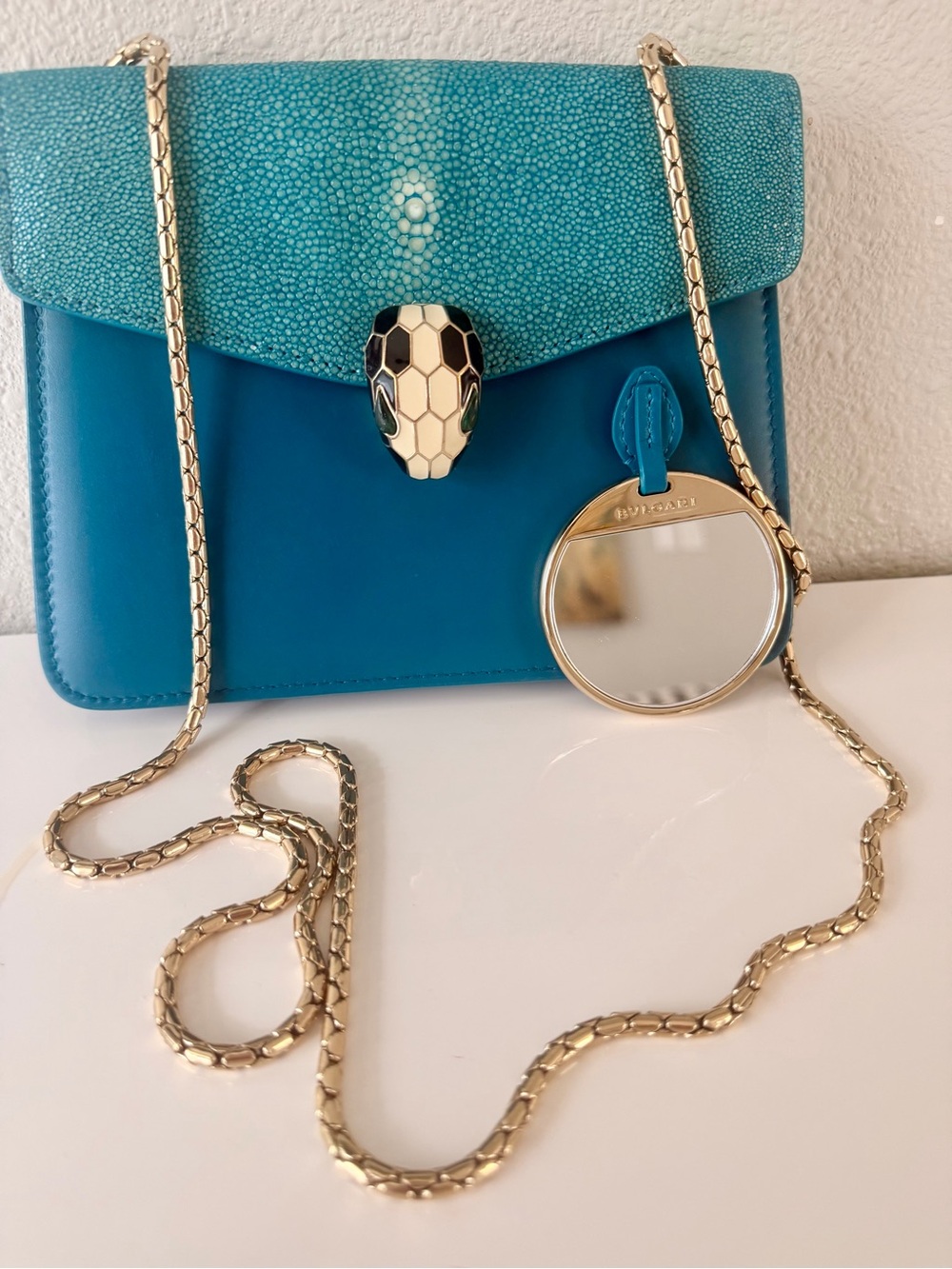 Exotic BVLGARI Serpenti Forever Stingray Purse in Turquoise, Purple Interior